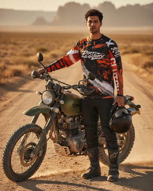 Man standing next to a motorcycle in a desert setting